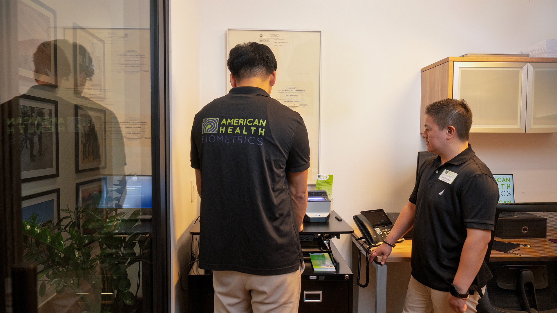 American Health Biometrics technicians assisting a client